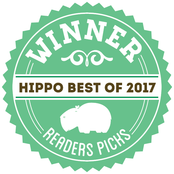A round graphic badge that reads Winner hippo best of 2020 Readers Pick, in the colors mint green and white