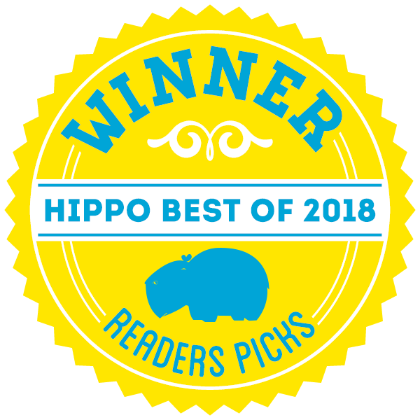 A round graphic badge that reads Winner hippo best of 2020 Readers Pick, in the colors yellow and cyan