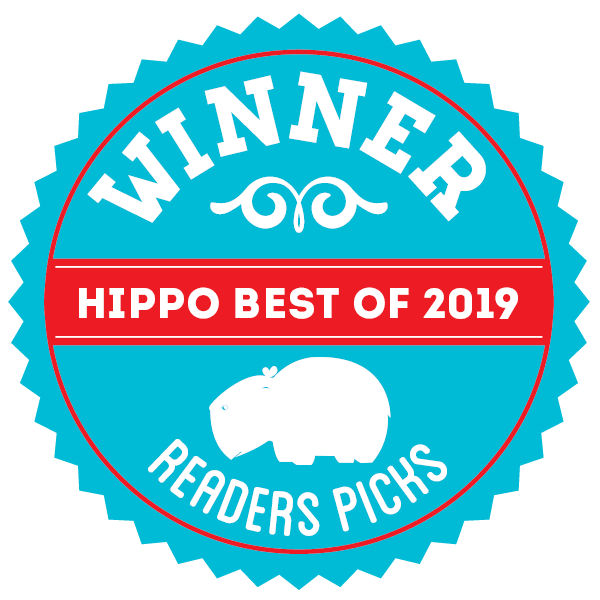 A round graphic badge that reads Winner hippo best of 2020 Readers Pick, in the colors cyan and red