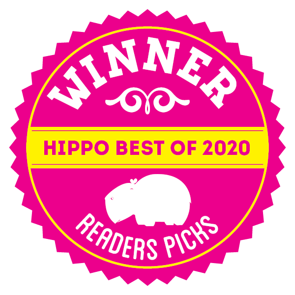 A round graphic badge that reads Winner hippo best of 2020 Readers Pick, in the colors magenta and yellow