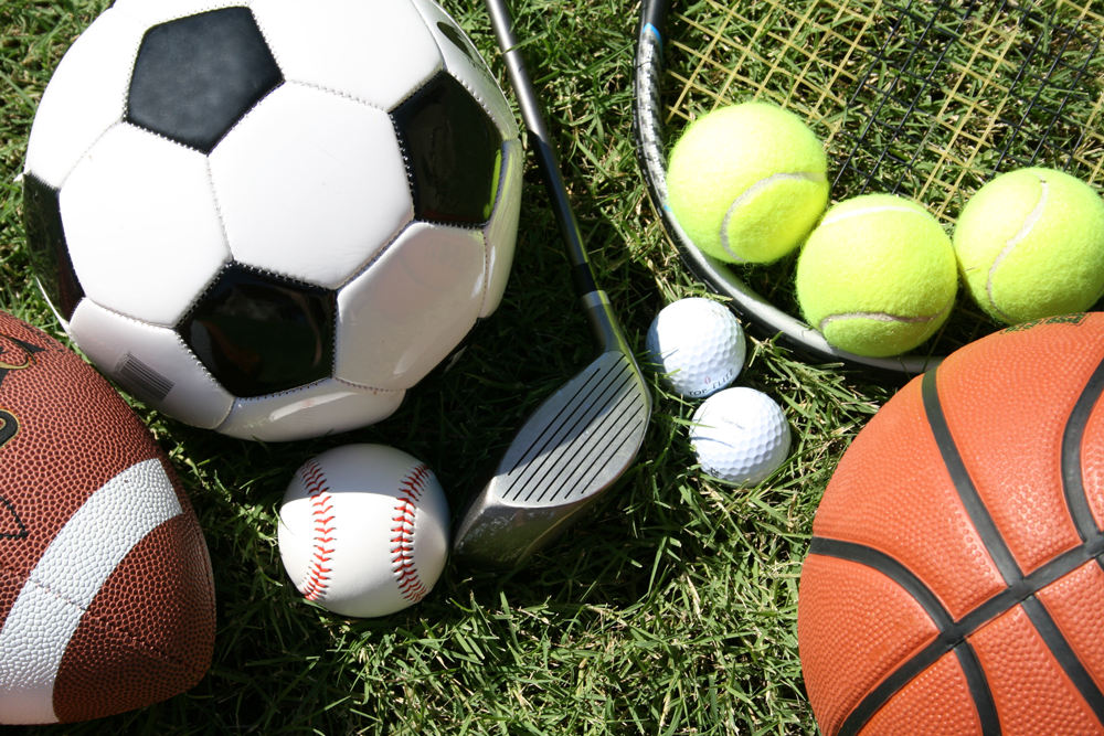 Photo of assorted sports equipment for football, soccer, tennis, golf, baseball, and basketball