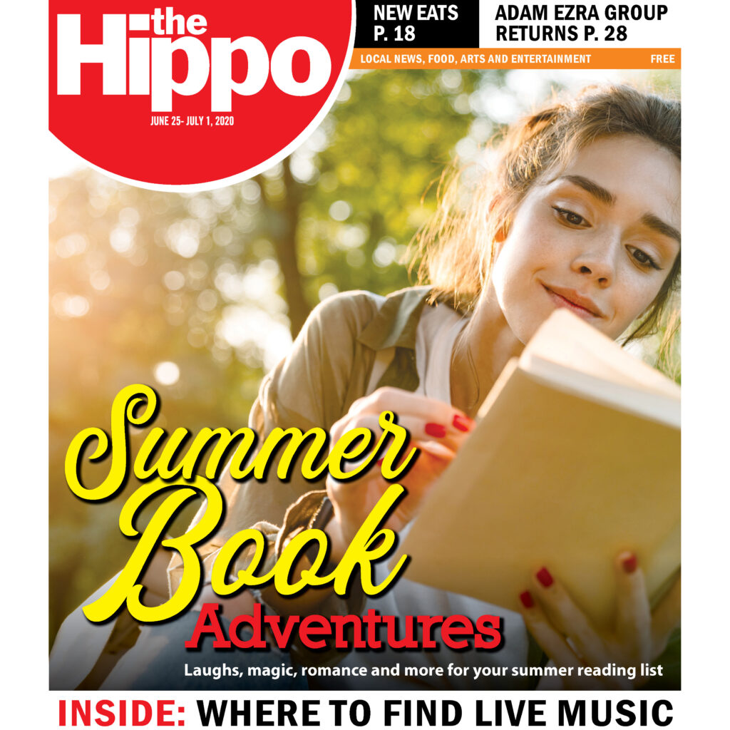 Hippo cover for June 25th 2020, has photo of pretty woman laying in grass and reading on a sunny day, a headline reads Summer Book Adventures