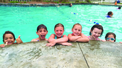 kids having fun in a swimming pool