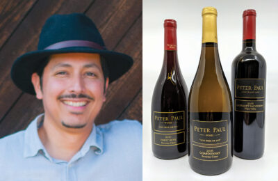 portrait of a man in a black hat, 3 wine bottles on white background