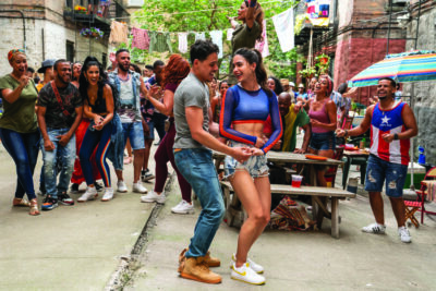 (Left Center-Right Center) ANTHONY RAMOS as Usnavi and MELISSA BARRERA as Vanessa in Warner Bros. Pictures’ “IN THE HEIGHTS,” a Warner Bros. Pictures release. Photo Credit: Macall Polay