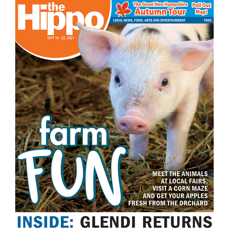 cover of newspaper featuring adorable piglet