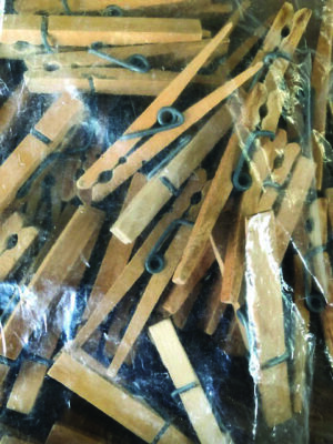 close up of clothes pins in plastic bag