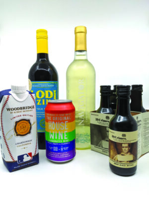 assortment of wines in bottles, and cans on blank background