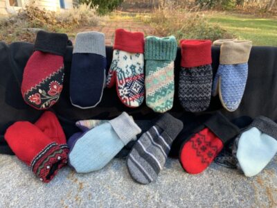 outside display of knit winter mittens
