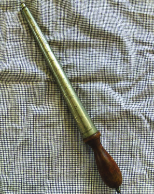 old fashioned ring sizer, which is a tapered metal rod with a wooden handle