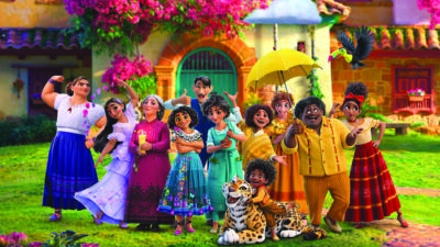 still from animated movie, Encanto, showing the cast of characters in front of a house