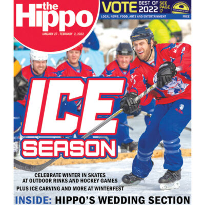 frontpage of the Hippo, man playing ice hockey on outdoor rink