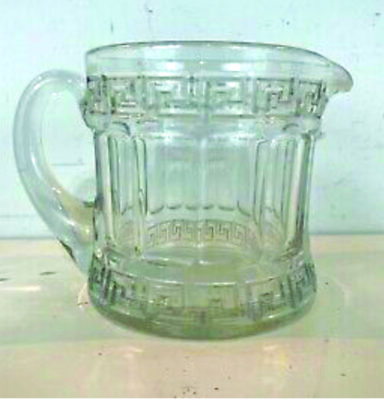 glass pitcher with geometric square designs