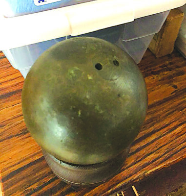 vintage shot put, a brass ball mounted on base