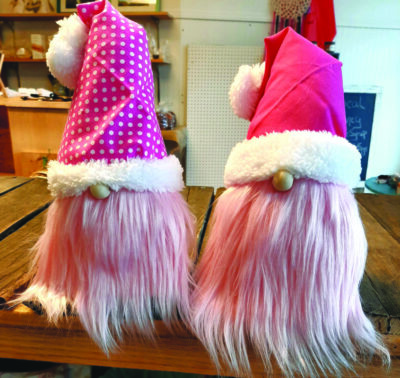 fabric handcrafted gnomes wearing cone shaped winter hats