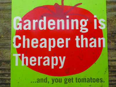 bumper sticker that reads "Gardening is Cheaper than Therapy... and you get tomatoes"