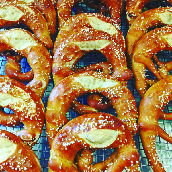 Rows of salted pretzels from an artisan bakery