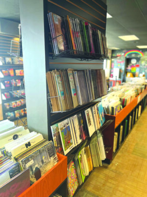 shelves full of albums in record store