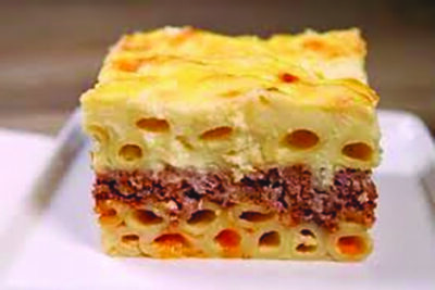 portion of Greek lasagna on plate