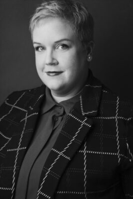 professional headshot of woman in business suit