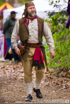 man at renaissance faire dressed in costume