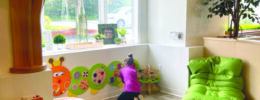 young girl playing in child friendly space