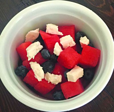 watermelon cubes, blueberries, and feta cheese in a bowl