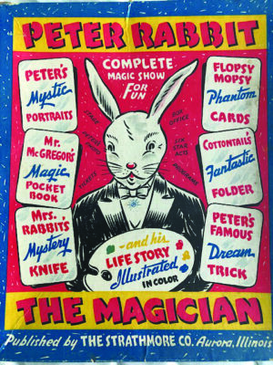 box top of 1940s game, illustrated with white rabbit in tuxedo and listing magic tricks inside
