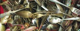 jumble of assorted antique silverware