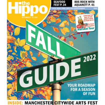 Illustrated cover - Fall Guide put on road sign, autumn leaves in background