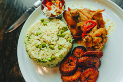 plate with chicken, rice, plantains, seen from above