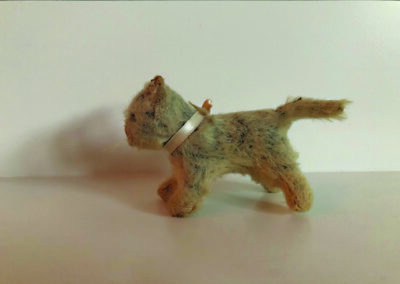 antique stuffed cat, worn from age
