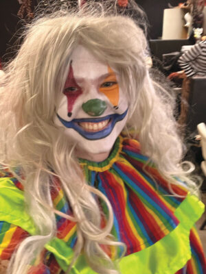 woman dressed as scary clown