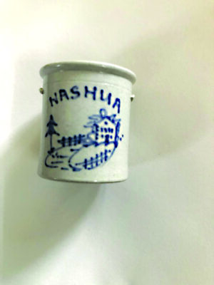 miniature crock with painted image of house and the word Nashua