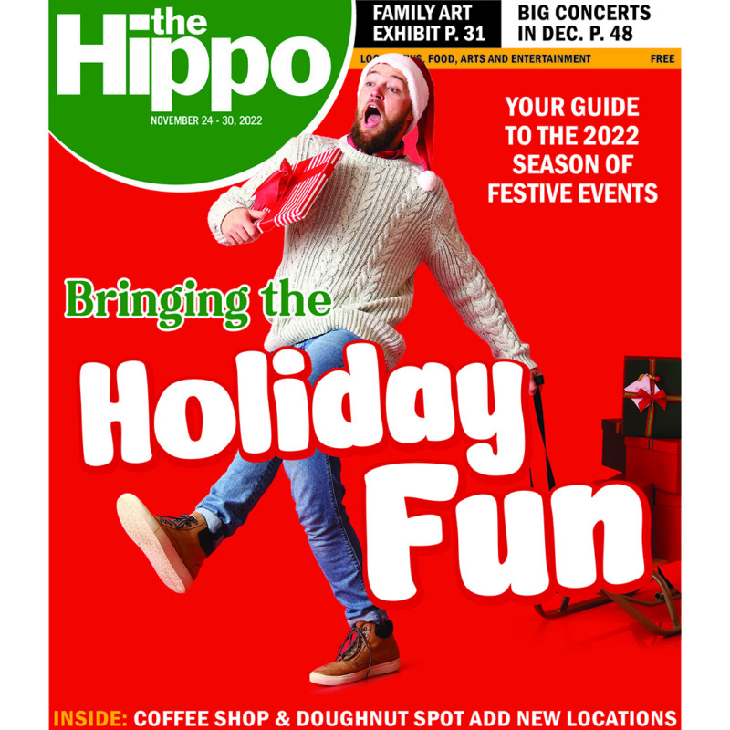 cover of Hippo, Holiday fun, man pulling wagon full of gifts