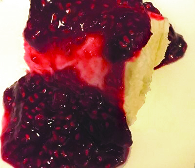 raspberry jam spread on cracker
