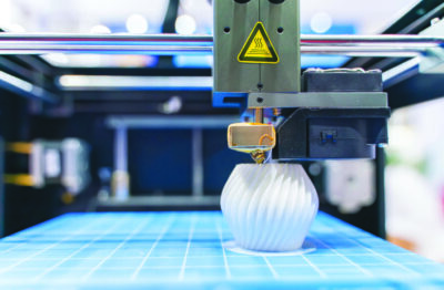 3D printer or additive manufacturing and robotic automation technology.