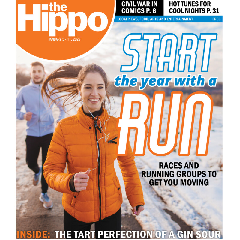 cover page of Hippo, Start the year with a run, showing man and woman running down road in snow