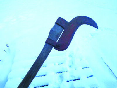 metal brush hook in snow