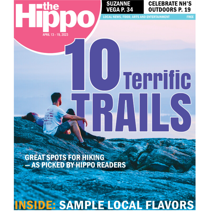 Hippo cover showing 2 people sitting on rocks at mountain summit at sunrise