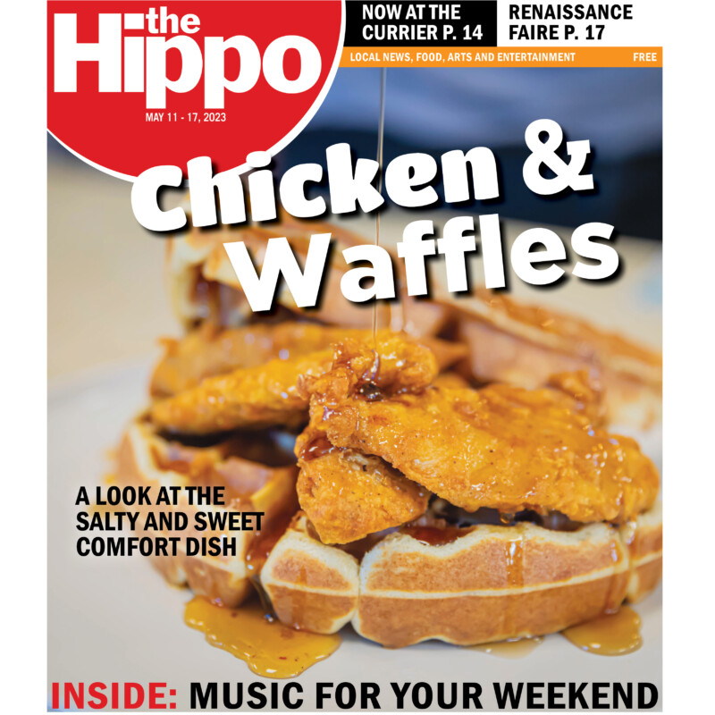 cover of the Hippo depicting a waffle topped with fried chicken and syrup and words above