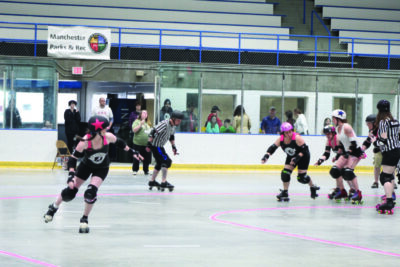 roller derby players on the rink