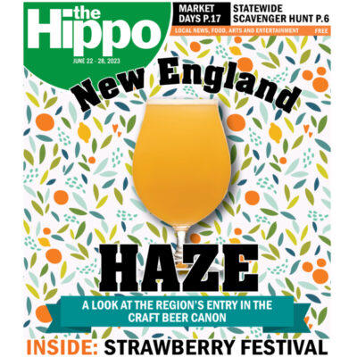 frontpage of the Hippo, new england haze, with image of beer in tulip glass over patterned background