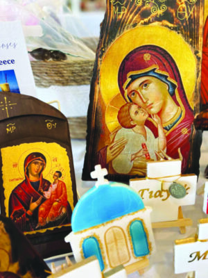 small Greek iconography paintings displayed on table