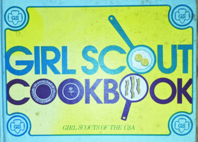 cover of Girl Scout Cookbook with illustrations of eggs and bacon 