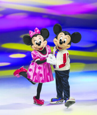 Mickey Mouse and Minnie Mouse holding hands while ice skating