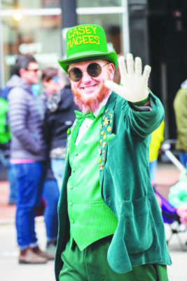 Man with red beard and glasses dressed like a leprechaun