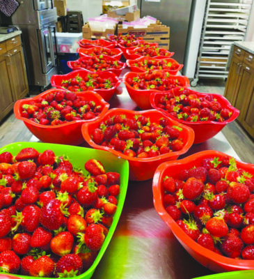 Buckets full of strawberries