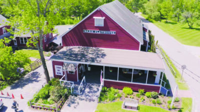 aerial view of red barn turned into playhouse