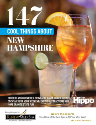 front cover of magazine with text reading 147 cool things about New Hampshire, showing 2 cocktails sitting on bar top